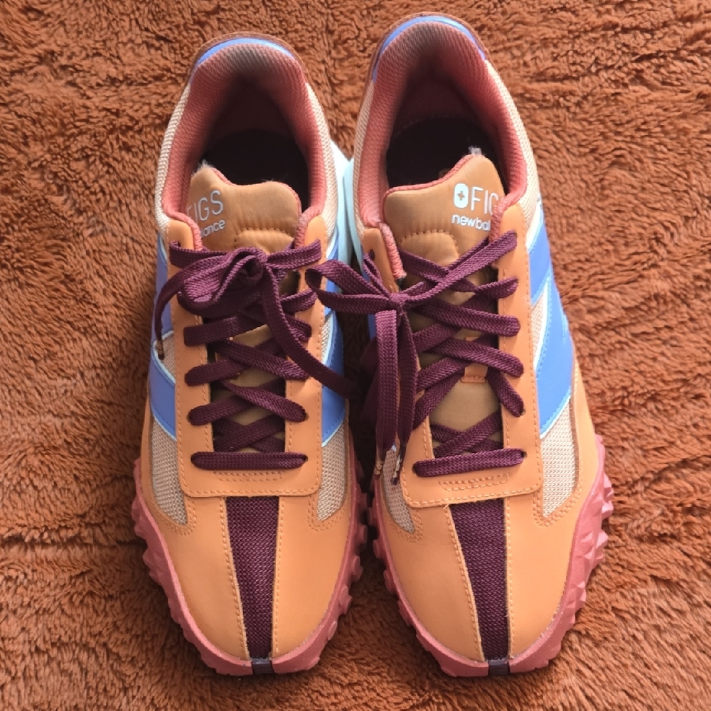 New Balance Sneakers with Orange, Blue, and Purple Accents
